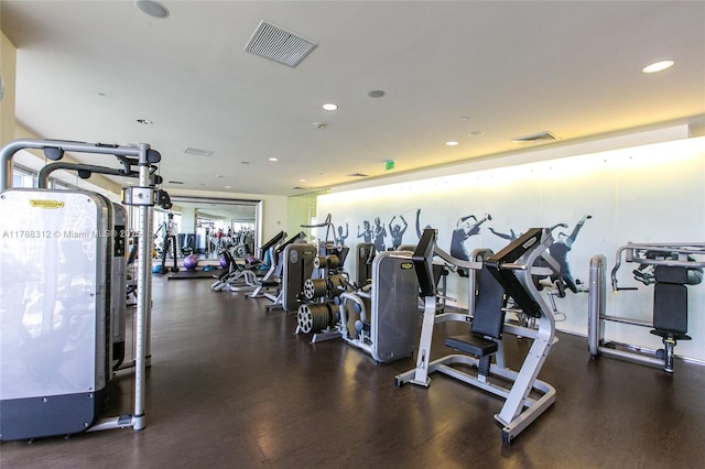 gym with recessed lighting and visible vents