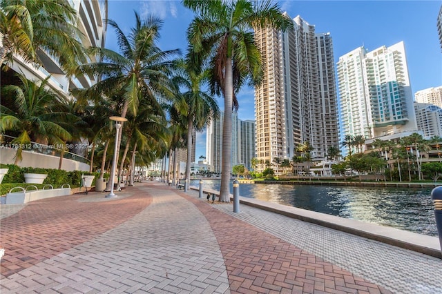view of property's community featuring a water view and a view of city
