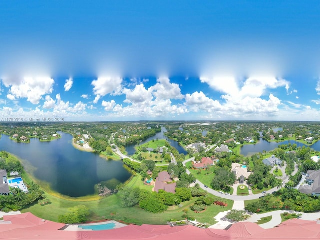 aerial view of residential area with a nearby body of water