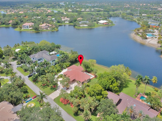 aerial perspective of suburban area featuring a large body of water
