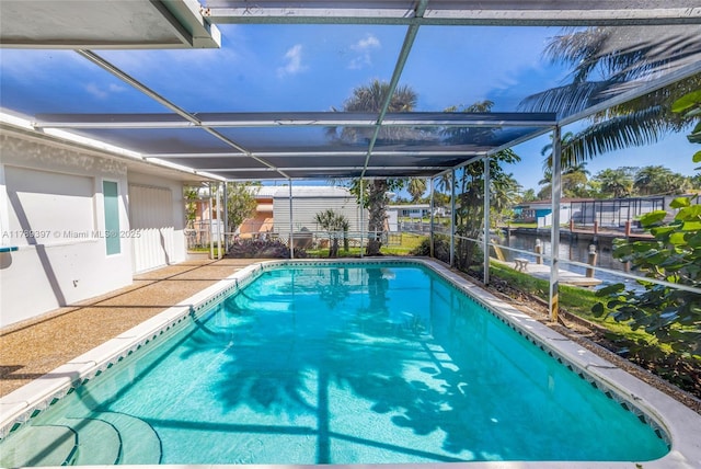 2020 NW 33rd Ct, Oakland Park, FL 33309 - pool with fence, a lanai, and a water view