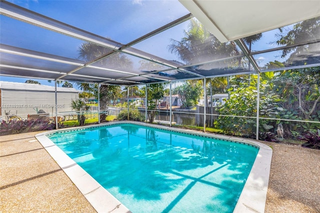 2020 NW 33rd Ct, Oakland Park, FL 33309 - outdoor pool with a lanai and a fenced backyard