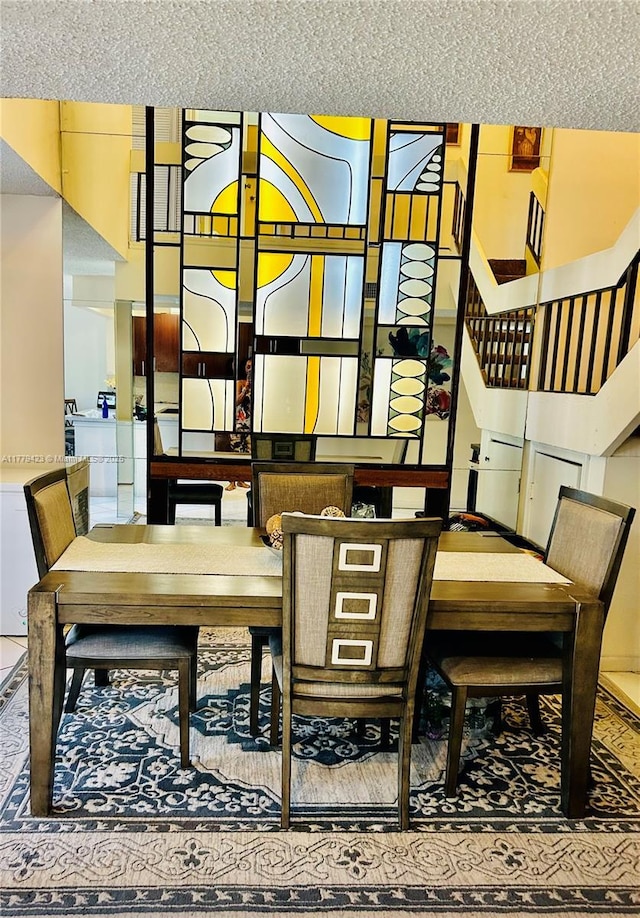 2554 N 38th Ave Unit C-26, Hollywood, FL 33021 - dining space with a textured ceiling and separate washer and dryer