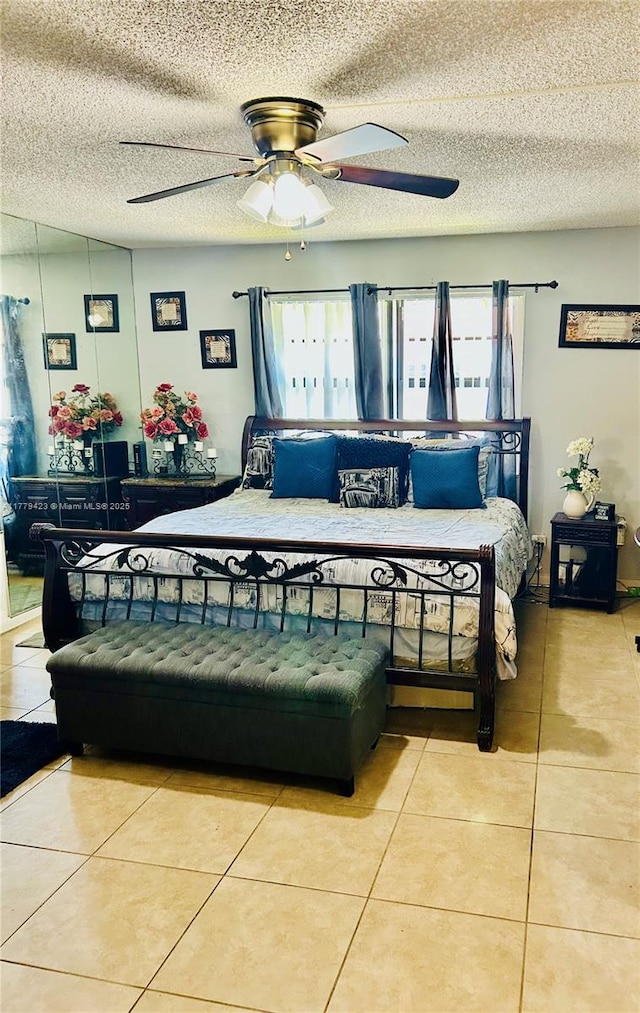 2554 N 38th Ave Unit C-26, Hollywood, FL 33021 - tiled bedroom with ceiling fan and a textured ceiling