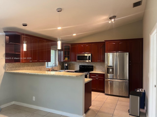 7522 SW 6th St, North Lauderdale, FL 33068 - kitchen featuring stainless steel appliances, vaulted ceiling, backsplash, a peninsula, and light tile patterned floors
