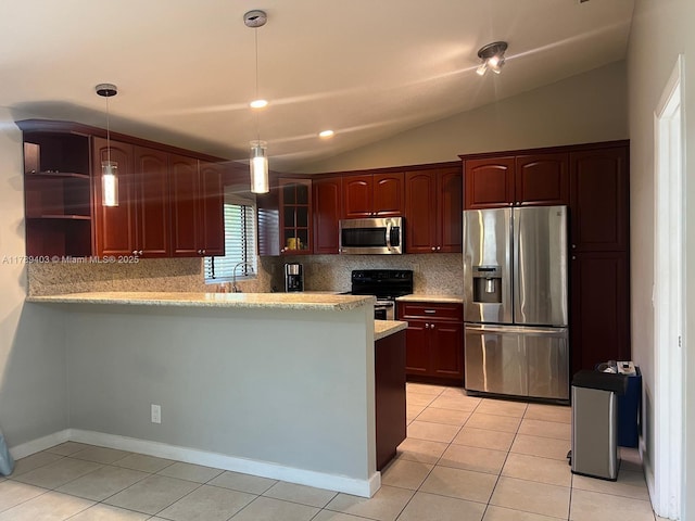 7522 SW 6th St, North Lauderdale, FL 33068 - kitchen with stainless steel appliances, light tile patterned flooring, a peninsula, backsplash, and vaulted ceiling