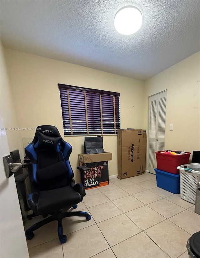 7522 SW 6th St, North Lauderdale, FL 33068 - office area featuring a textured ceiling and tile patterned flooring
