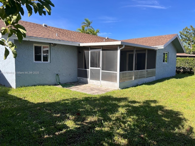 7522 SW 6th St, North Lauderdale, FL 33068 - rear view of house with stucco siding, a sunroom, a lawn, and a shingled roof