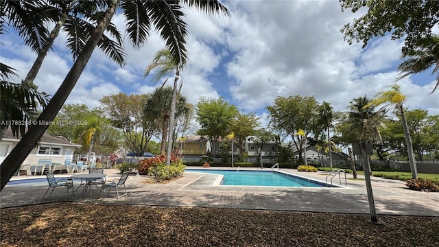 12222 SW 148th St, Miami, FL 33186 - community pool with a patio and fence
