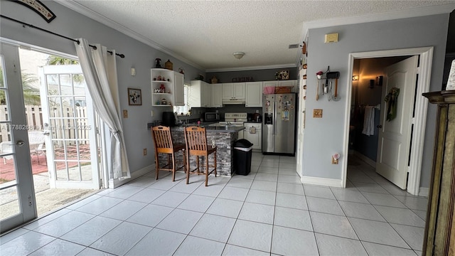 12222 SW 148th St, Miami, FL 33186 - kitchen featuring a textured ceiling, open shelves, crown molding, a peninsula, and stainless steel fridge