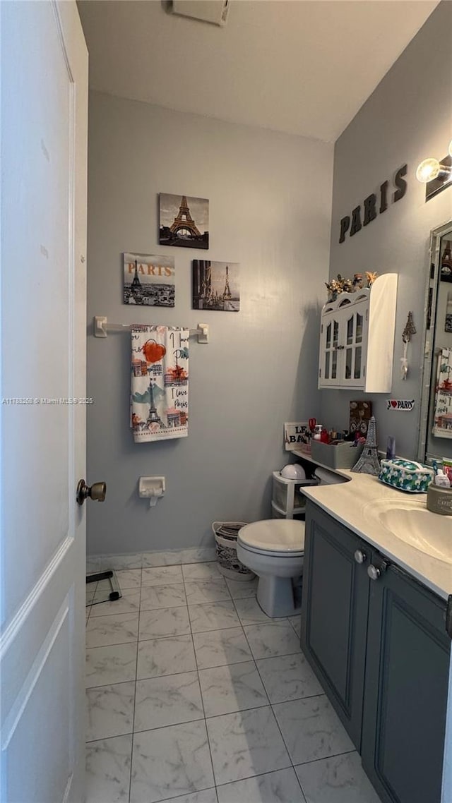 12222 SW 148th St, Miami, FL 33186 - bathroom with toilet, marble finish floor, and vanity