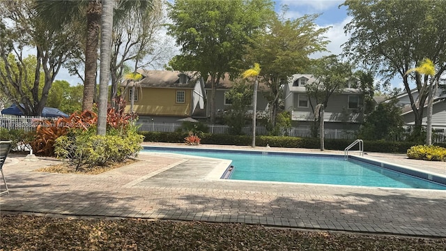 12222 SW 148th St, Miami, FL 33186 - community pool featuring fence, a patio, and a residential view