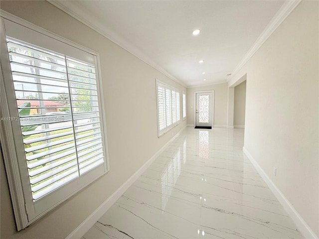 corridor with marble finish floor, crown molding, baseboards, and recessed lighting