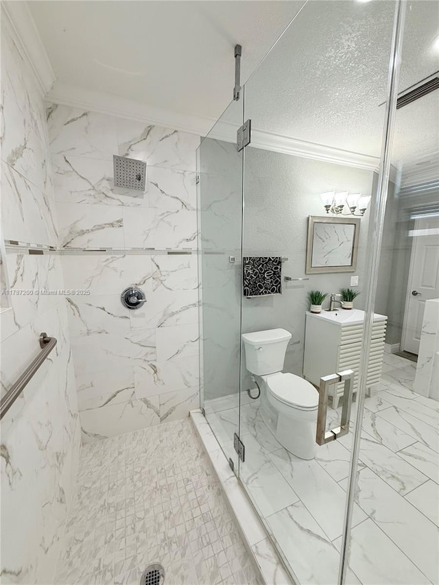 bathroom with a marble finish shower, vanity, marble finish floor, toilet, and ornamental molding