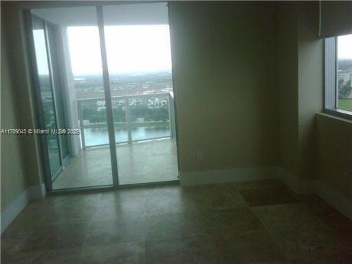 2681 N Flamingo Rd Unit 1501S, Sunrise, FL 33323 - unfurnished room with baseboards