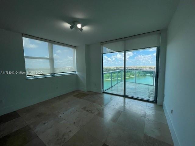 2681 N Flamingo Rd Unit 1501S, Sunrise, FL 33323 - unfurnished room with plenty of natural light