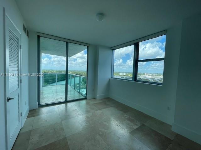 2681 N Flamingo Rd Unit 1501S, Sunrise, FL 33323 - spare room with baseboards