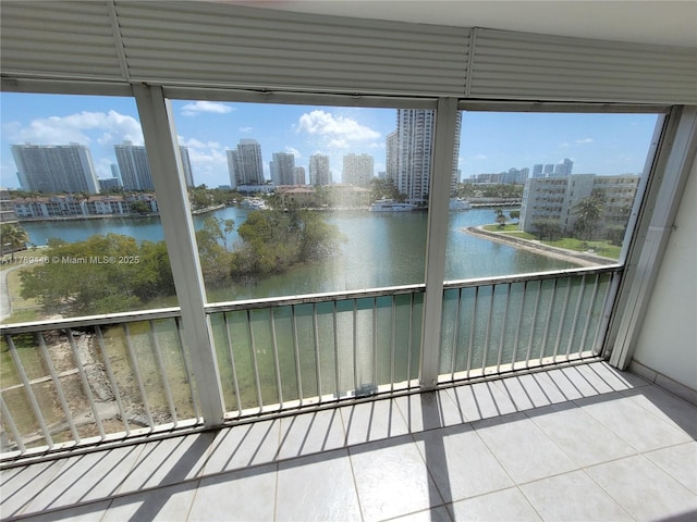 2930 Point E Dr Unit E603, Aventura, FL 33160 - unfurnished sunroom featuring a city view and a water view