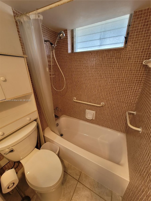 2930 Point E Dr Unit E603, Aventura, FL 33160 - bathroom with tile patterned floors, shower / bathtub combination with curtain, and toilet