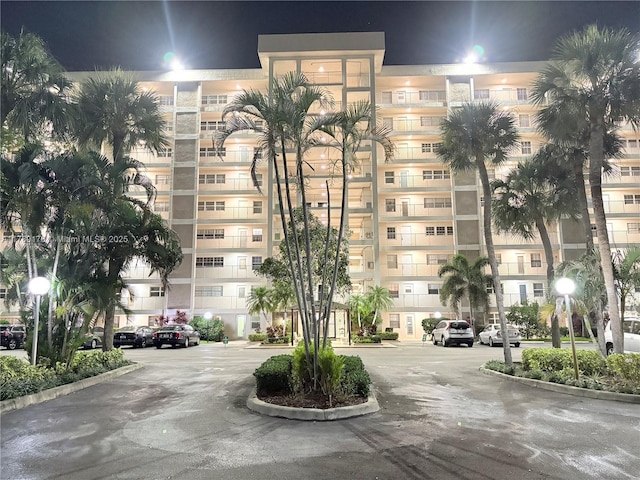 2671 S Course Dr Unit 409, Pompano Beach, FL 33069 - view of property at twilight