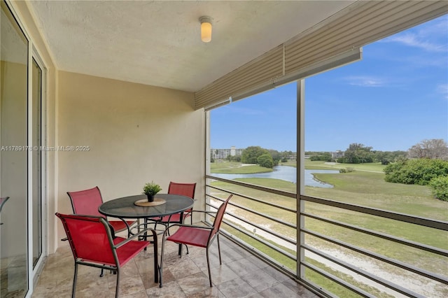 2671 S Course Dr Unit 409, Pompano Beach, FL 33069 - balcony featuring view of golf course and a water view
