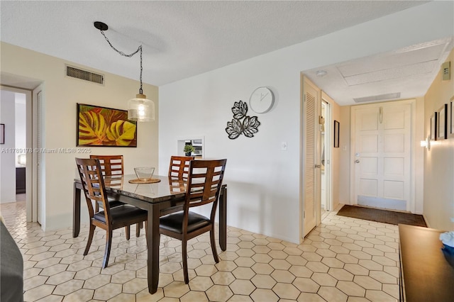 2671 S Course Dr Unit 409, Pompano Beach, FL 33069 - dining space with visible vents