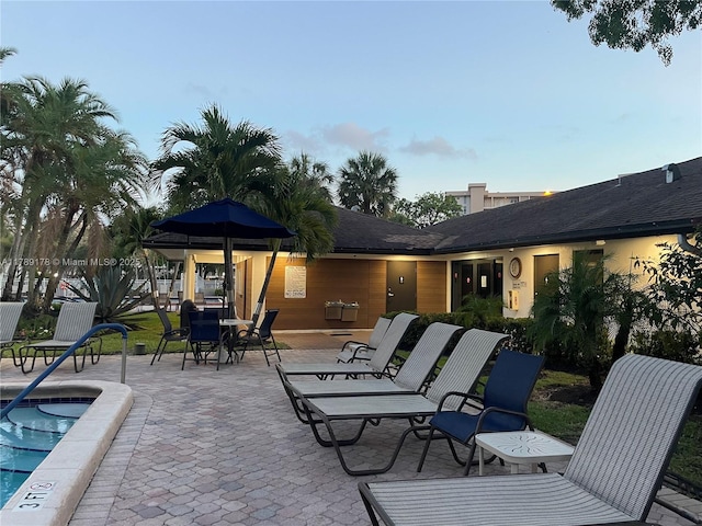 2671 S Course Dr Unit 409, Pompano Beach, FL 33069 - view of patio / terrace featuring a community pool