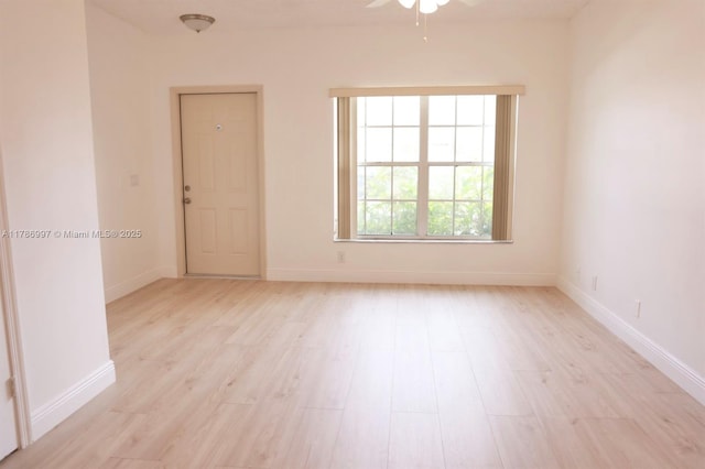 16686 Hemingway Dr Unit 16686, Weston, FL 33326 - empty room featuring baseboards, a ceiling fan, and light wood finished floors