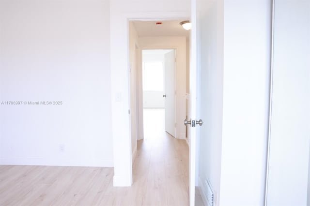 16686 Hemingway Dr Unit 16686, Weston, FL 33326 - corridor with baseboards and light wood-style flooring