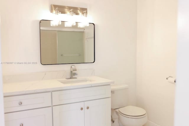 16686 Hemingway Dr Unit 16686, Weston, FL 33326 - bathroom featuring baseboards, toilet, and vanity