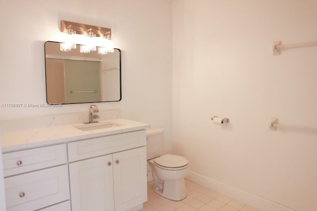 16686 Hemingway Dr Unit 16686, Weston, FL 33326 - bathroom featuring baseboards, toilet, vanity, and tile patterned floors