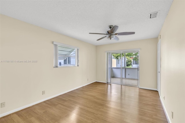 1171 NW 88th Way, Plantation, FL 33322 - empty room featuring wood finished floors, a ceiling fan, and a textured ceiling