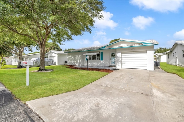 1171 NW 88th Way, Plantation, FL 33322 - ranch-style home with an attached garage, a front lawn, concrete driveway, stucco siding, and a metal roof
