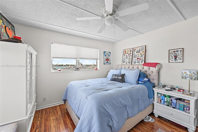 4500 N Flagler Dr Unit C24, West Palm Beach, FL 33407 - bedroom featuring a ceiling fan and wood finished floors