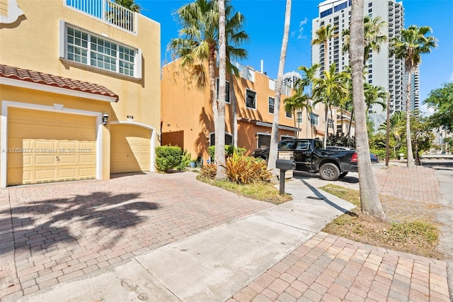 exterior space with a garage and driveway