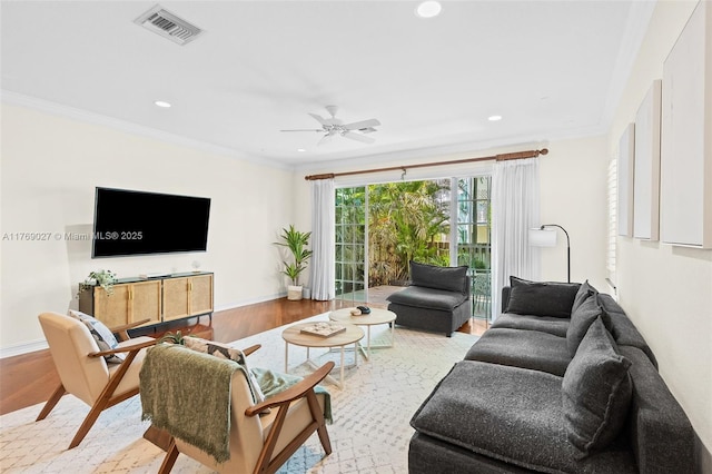 living area featuring ceiling fan, wood finished floors, visible vents, and recessed lighting