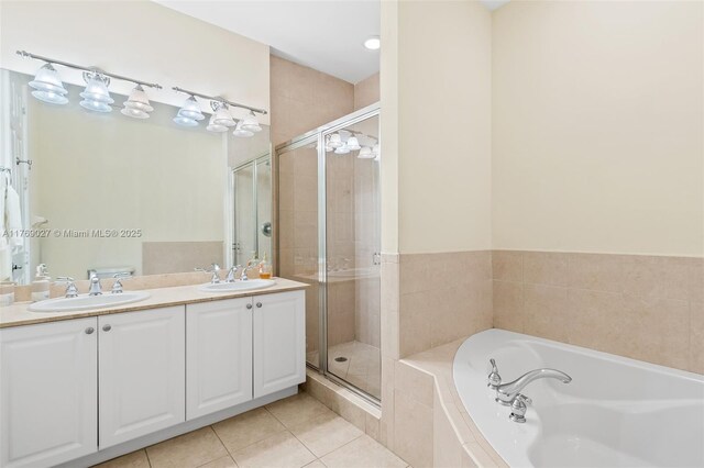 419 SW 5th St Unit 419, Fort Lauderdale, FL 33315 - full bath featuring a bath, a shower stall, double vanity, and tile patterned flooring