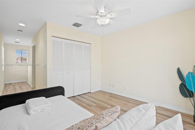 419 SW 5th St Unit 419, Fort Lauderdale, FL 33315 - bedroom with wood finished floors, a closet, a ceiling fan, and recessed lighting