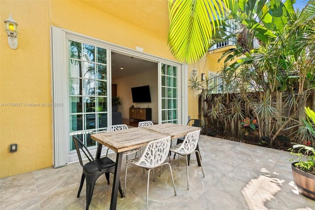419 SW 5th St Unit 419, Fort Lauderdale, FL 33315 - view of patio / terrace featuring outdoor dining area