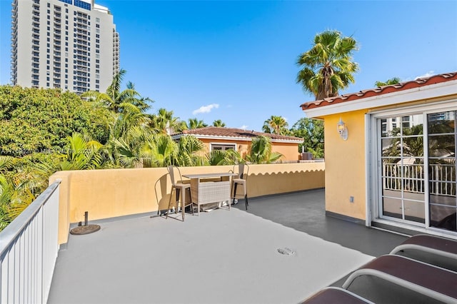 view of patio / terrace with a balcony