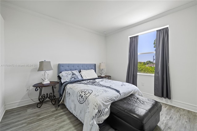 3007 W 8th St, Lehigh Acres, FL 33971 - bedroom featuring wood finished floors, baseboards, and ornamental molding