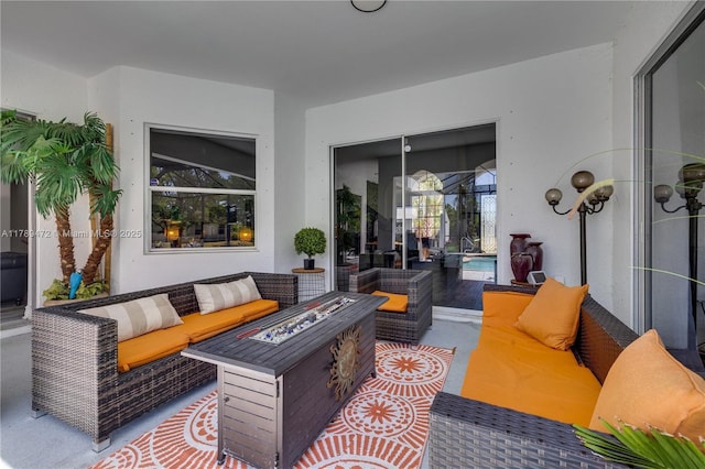 3007 W 8th St, Lehigh Acres, FL 33971 - view of patio / terrace featuring an outdoor living space with a fire pit and an outdoor pool