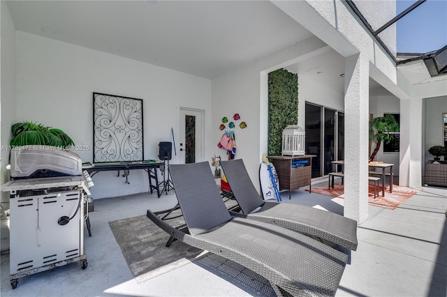 3007 W 8th St, Lehigh Acres, FL 33971 - view of swimming pool featuring a patio area, an outdoor hangout area, a pool with connected hot tub, and glass enclosure