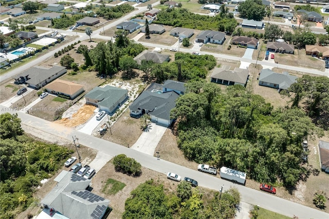3007 W 8th St, Lehigh Acres, FL 33971 - ranch-style house with a garage, concrete driveway, stucco siding, and a front lawn
