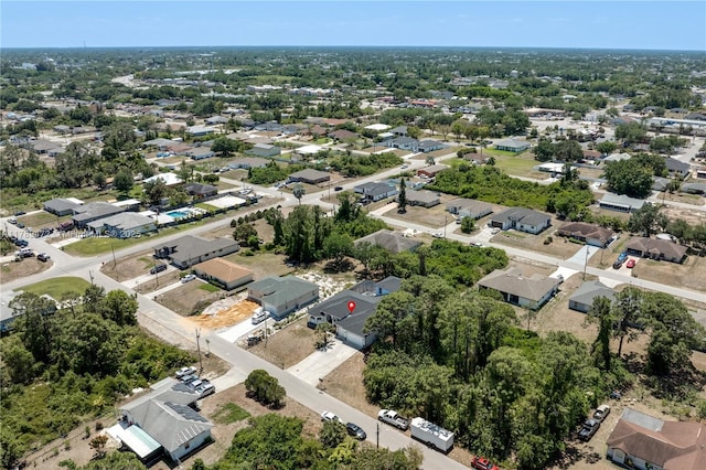 3007 W 8th St, Lehigh Acres, FL 33971 - aerial overview of property's location with nearby suburban area
