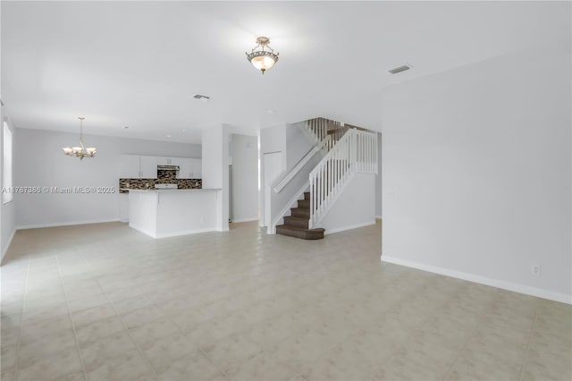 1042 Bluewood Ter, Weston, FL 33327 - unfurnished living room with a chandelier, stairway, baseboards, and light flooring