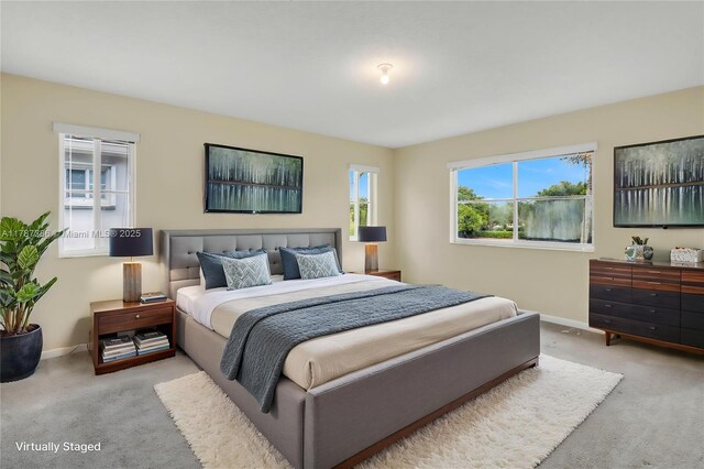 1042 Bluewood Ter, Weston, FL 33327 - carpeted bedroom featuring baseboards
