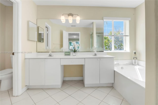 1042 Bluewood Ter, Weston, FL 33327 - full bathroom featuring vanity, a garden tub, toilet, a stall shower, and tile patterned flooring