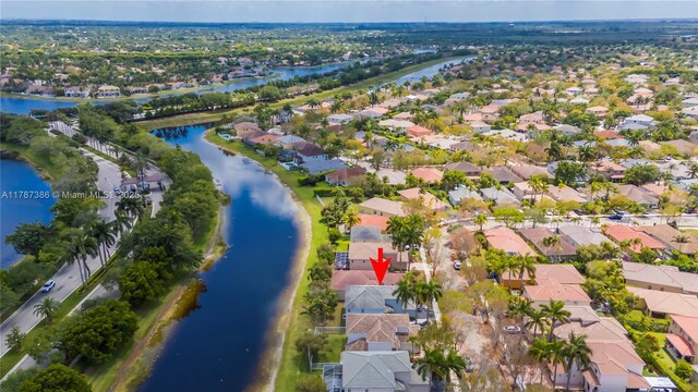 aerial view with a residential view and a water view