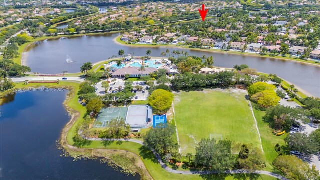 aerial view with a residential view and a water view